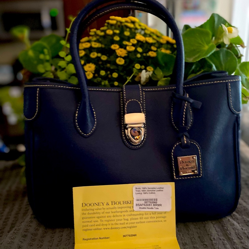 Dooney dark blue like new comes with dust bag